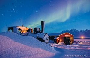 Cool spot: The building where Ms Travers worked and its backdrop – the Northern Lights, or Aurora Borealis. Pictures: Jan Sivert Hauglid