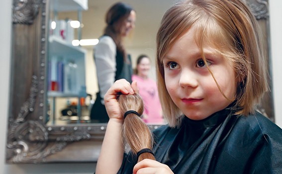 Getting wiggy with it: Jessica Bakionozos had her hair cut by Kellie Tredwell-Noonan of Dirty Little Secrets hairdressers in Hastings to make a wig for cancer sufferers. Picture: Yanni