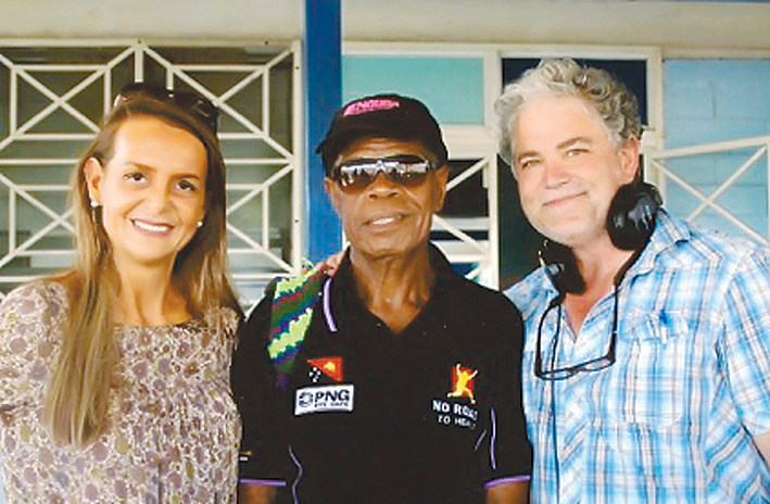 Medical help: Steph Ryan, Papua New Guinea community health worker Rodney and filmmaker Sean Cousins are working to bring children to Melbourne for life-changing surgery.