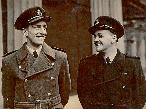 Keith (on the right) at Buckingham Palace, May 1944 with with pilot, Flt.Lt. P.A.F Hawkin, who also received the DFM. Below: The citation for the Distinguished Flying Medal.