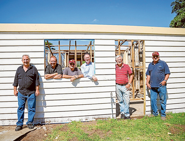 Good work: Community projects officer Ken Dyson, Cr Tim Rodgers, Wood Workers’ Greg Millar, Cr Hugh Fraser, and Wood Workers’ Dennis Conner and Gavin Davis, proudly show off their handicraft.