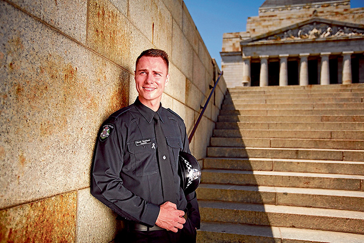 Huge sacrifice: Constable Steven Newland remembers police relative lost at Anzac. Picture: Craig Sillitoe, Courtesy Police Life