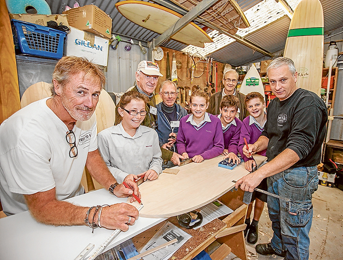 Trading skills: Gary Miller (left) and Rob Ivers (right), of Tree to Sea with members of Mornington Men’s Shed and Mt Eliza Secondary College students who are swapping skills that come easily to their respective generations (Ester Woods, Barry Frederickdon, Alan Grimes, Jessika Small, Ben Maclean, Tony Sinclair and Cory Riddle}. Pictures: Yanni