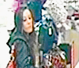 Fake $50 note: CCTV image of the woman sought by police.