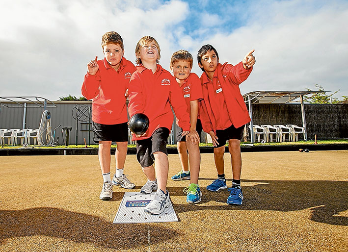 One up: Charlie, Josh, Daniel and Isao of Sorrento Primary School team which won the inaugural Primary School Lawn Bowls Challenge. Picture: Yanni