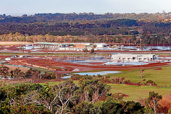 Wedge servos: The controversial freeway service centres on Peninsula Link at Baxter. The southbound one, top, is set to open this week and its northbound “twin” with its own wetlands will be ready by December. Picture: Gary Sissons