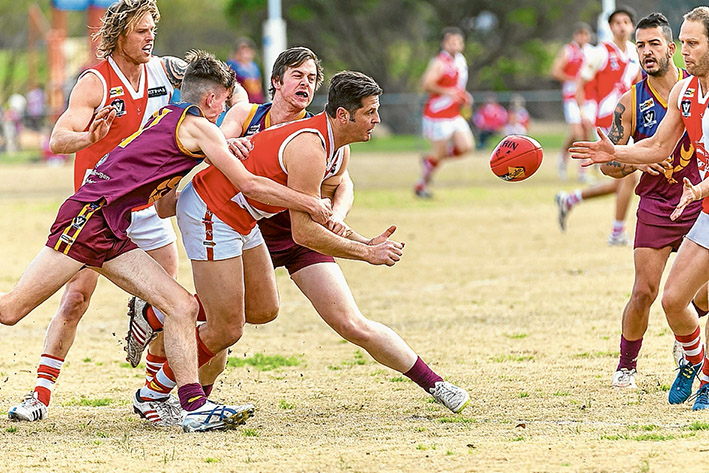 Milestone match: Guy Stringer gets one away during his 400th game. Picture: Andrew Hurst