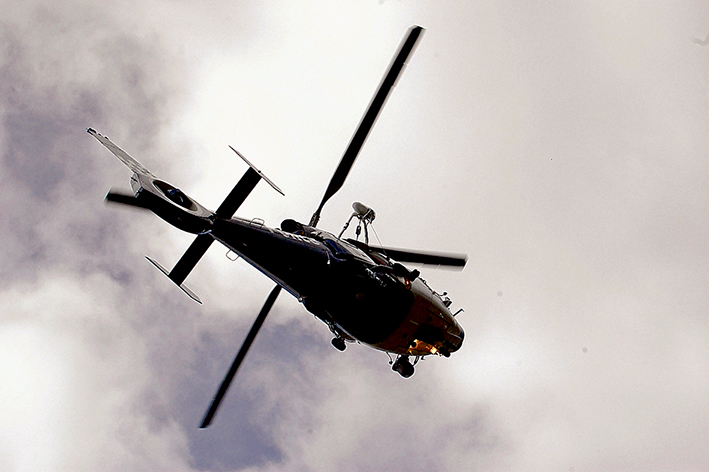 Pad protest: Pen X was originally formed to fight proposals for five helicopter landing pads across the Mornington Peninsula but quickly morphed into a more wide-ranging activist group. The group was against the increased use of private and commercial helicopters, not those used by emergency services or the police, as pictured.