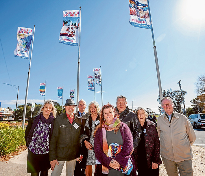 Flag raising: At the unfurling of the flag at Rye are, from left, Lynette Edwards, Michael Leeworthy, Peter Houghton, Sabra Lazarus, Jo Ridgeway,Miodrag Jankovic, Mechelle Cheers and Hugh Fraser. Picture: Yanni