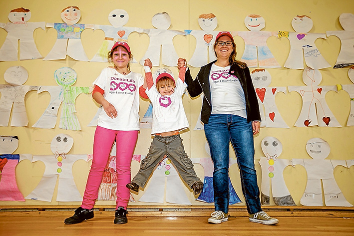Sisterly love: Savannah’s concern for here brother Jagger gave her the impetus to raise money and awareness of the Donate Life project. The siblings are pictured with their mother Amelia LeeFangmeier. Picture: Yanni