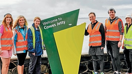 Walk’s end: Flinders MP Greg Hunt, centre, at Cowes jetty on Friday with some of the people who joned and supported his walk, including, Bass Coast Shire mayor Kimberley Brown, Marilyn Myszka, and members of his staff Christian Lee and Samantha Robin.