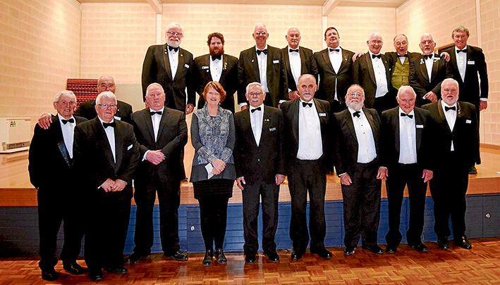 Handover: Alison Smyrk, of Western Port Community Centre, with the master of Balnarring Freemasons Lodge Ron Harrison, on her left, and other lodge members after receiving a $5000 cheque for the centre.