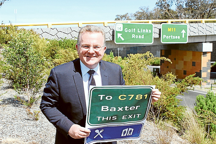 New direction: Federal Dunkley MP Bruce Billson said new signage will be installed on Peninsula Link in time for summer.