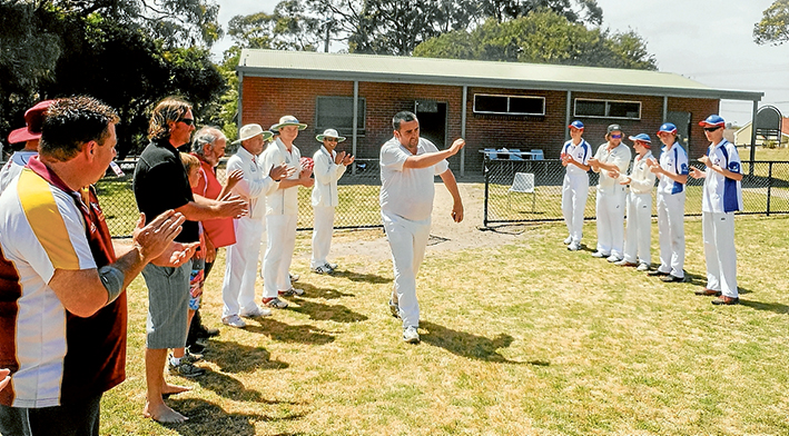 Field of dreams: Michael Voss applauded onto the field as he approaches his 300 th game for Mornington. Picture: Stephen Voss