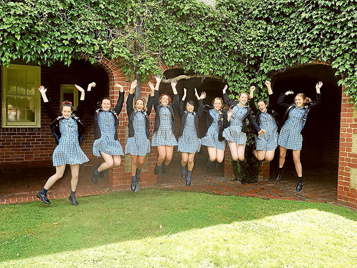 Top of the class: Toorak College Dux Jessica Wu, below, and, Toorak College higher achievers, above’ celebrate their success