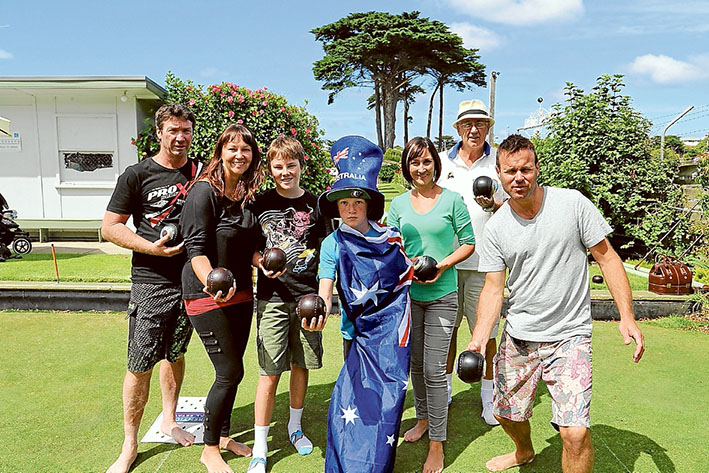 Jack high: Getting into the spirit of the barefoot bowls fun last year, above, and, below, Southern Peninsula Singers perform at last year’s event.