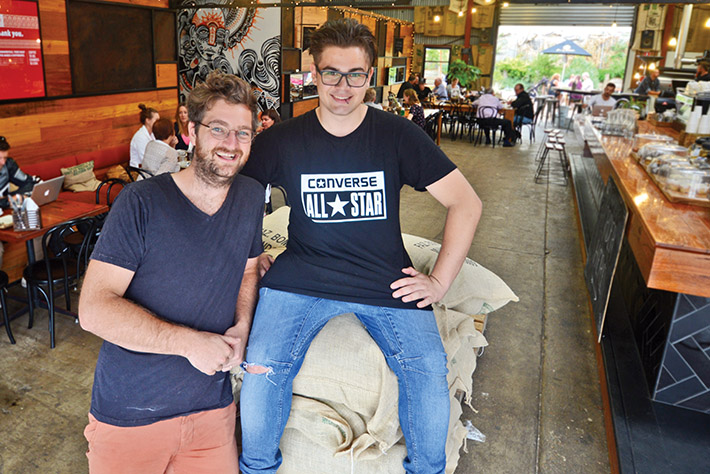 Fertile ground: The art of coffee making is now a big part of Leigh Williams’ life, right, seen here with Commonfolk cafe’s Sam Keck. Picture: Jarryd Bravo