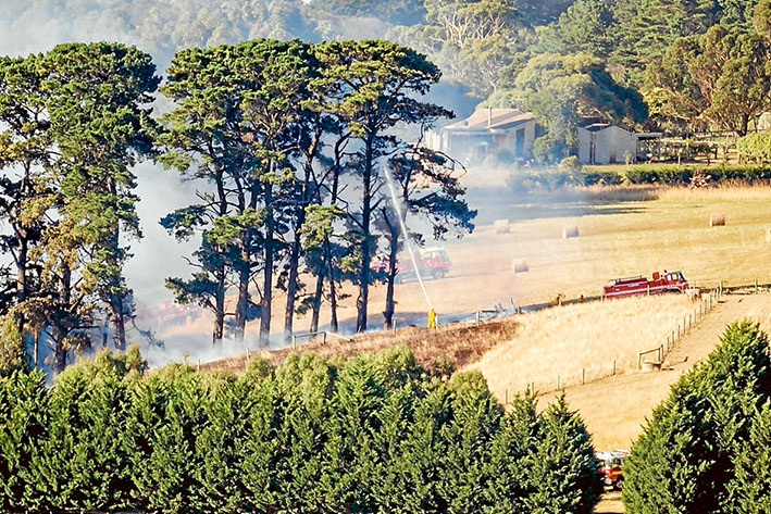 Blaze stopped: Fire crews acted quickly to extinguish a fire on a Main Creek property a week ago last Saturday. Picture: Yanni