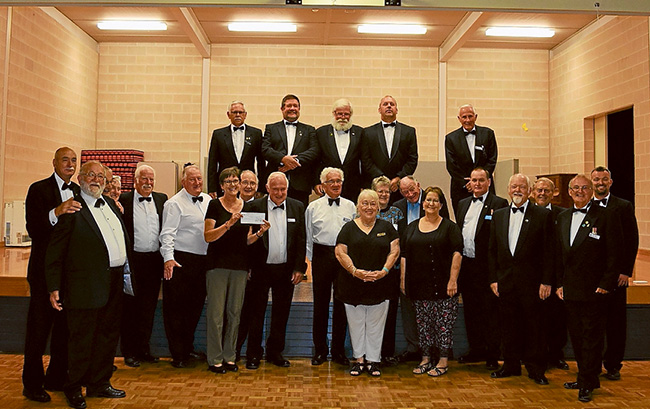 Good cause: Members, visitors and guests of Balnarring Lodge after the presentation of the $5000 cheque.