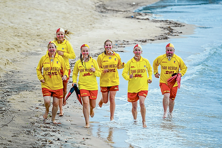 Girl power: An all-female patrol will ensure safety in the water at Gunnamatta on 14 February. They include Fran Brown, Dani Silvester, Emma Brown, Lucy Douglas and Jill Douglas, with the assistance of regional officer Toby Dobell. Picture: Yanni