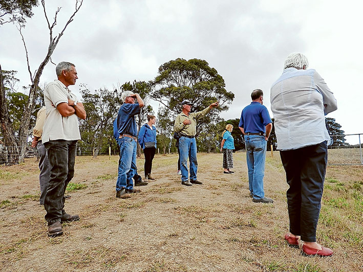 Field work: Small farm consultant David Stewart (khaki shirt) spoke of the benefits of erecting stock containment areas on a Coolart Rd property.