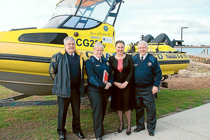 United front: Frankston Coast Guard flotilla commander Kevin English, left, Australian Volunteer Coast Guard national PR captain Deanne Semens, Emergency Services Minister Jane Garrett and Australian Volunteer Coast Guard National Commodore Ray Campbell. Picture: John Billing