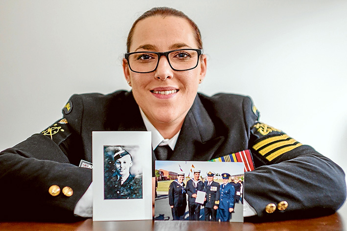 Family affair: Amanda Garstin with pictures of her maternal grandfather, John Langman, and her sister is Michelle and brother Michael, and father Godfrey. Picture: Yanni