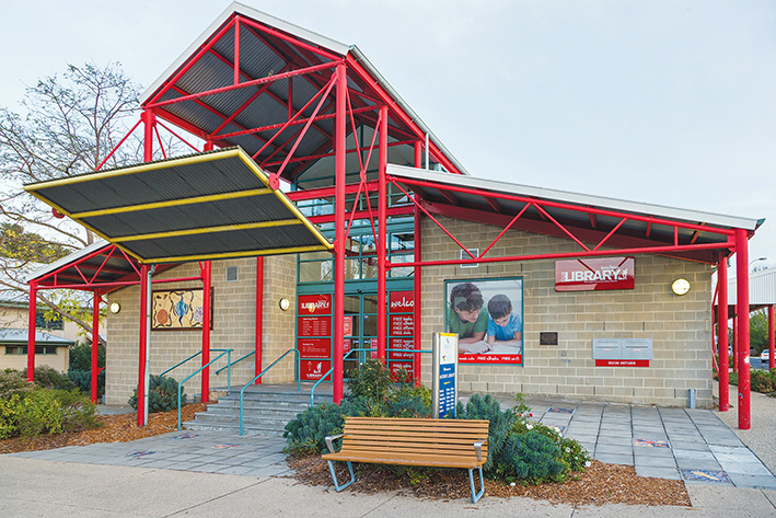 Closed for now: Neither the outside of Hastings library or the sign that says it’s being closed for renovations provide any clue to the inner turmoil being caused by staff cuts. Pictures: Gary Sissons