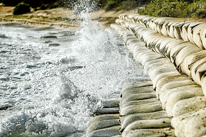 Wave power: Consultants are investigating using one or more of six options to bring sand permamantly back to restore Portsea’s front beach to its former sand-filled glory. Picture: Yanni