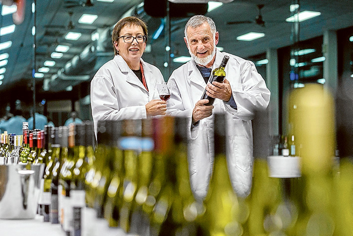 Class of their own: Head steward Phyllis Scales and International Cool Climate Wine Show chairman Kevin Wyatt taste their way through the classes of wine entered in this year’s show Mornington Racecourse last week. Picture: Gary Sissons