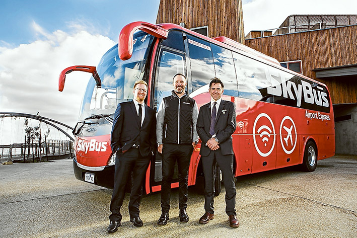 Express service: Frankston MP Paul Edbrooke, left, SkyBus director Adam Begg and Frankston mayor James Dooley look forward and the bus the runs to Melbourne Airport from Frankston and the Mornington Peninsula.