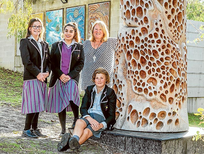 In their element: Esther Woods, Toogee, Charli-Rose Watson-Terrick, Wurundjeri, teacher Narelle Debenham and Ollie Curtis, Gunditjmara at McClelland Gallery. Picture: Gary Sissons