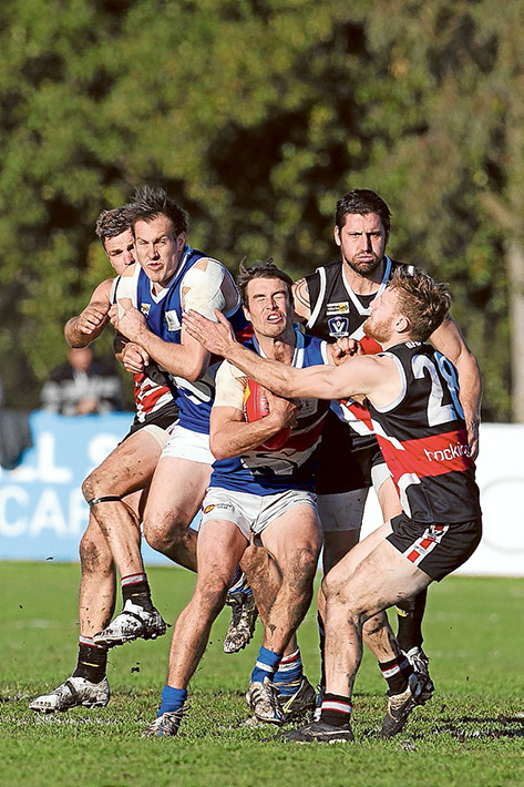 Shark attack: Mornington could not hold back Bonbeach who ran out 14 point winners. Picture: Scott Memery