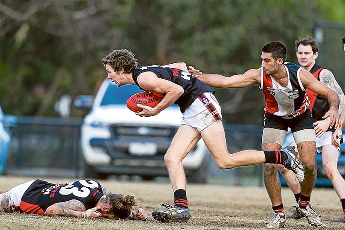 Double trouble: Frankston Bombers overcame Devon Meadows, beating them 88 points to 44. Picture: Scott Memery