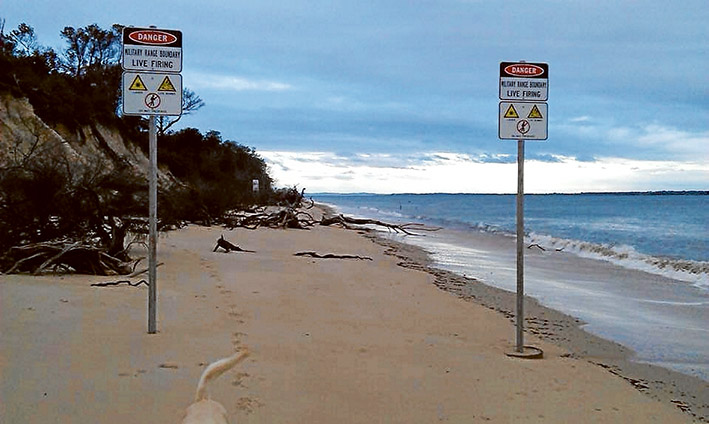Wrong message: The signs at Somers beach relate to dangers inland, not on the beach.
