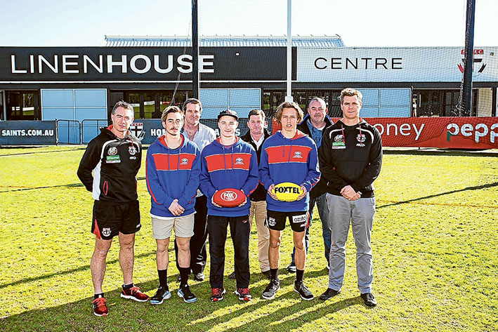 From the coach: St Kilda coach Alan Richardson with Mornington’s Lachie Hewett, Neil McKinnon, Kalen Bird, Alan Paley, Lachie Gorka and Brian Hewett, and St Kilda assistant coach Danny Sexton.
