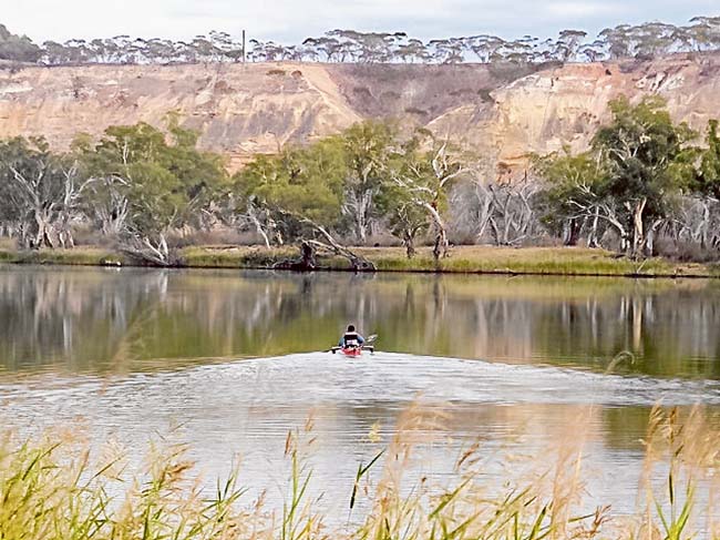 All aboard: Quadraplegic Dave Jacka kayaked 2226 kilometres down the Murray with the help of friends and an electronic device from Solve, a disability support group.
