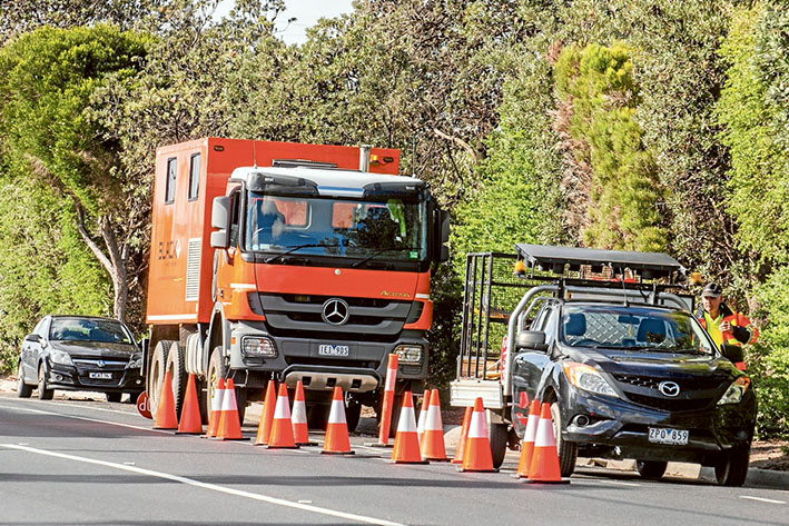 Testing, testing: Work crews testing soils and water levels between Edithvale and Aspendale along the Frankston line this month as part of the level crossings removal project. Picture: Gary Sissons