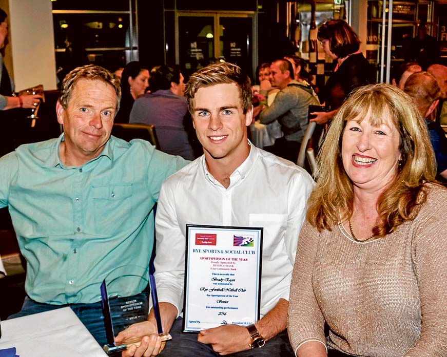 Sports honour: Brady Egan with parents Mark and Andrea.