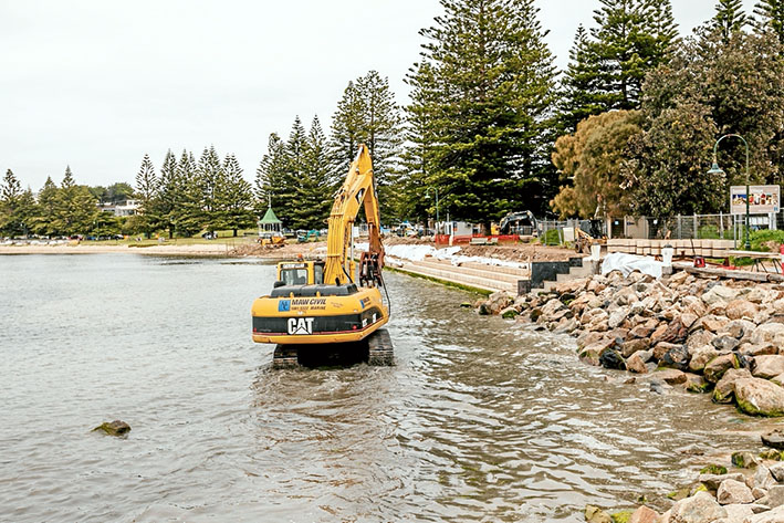 Water works: Work continues on installing new steps at Sorrento while the Department of Environment, Land, Water and Planning (DELWP) will soon begin trucking in sand to widen the beach. Picture: Yanni