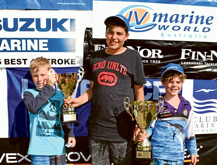 Junior Victorian Amateur Snapper Champion Hunter Blackford, of Frankston, right. Brodie King, of Manor Lakes, and Tommy Porto, of Baxter, share their runners-up cup after dead-heating. Pictures: Supplied and Gary Sissons