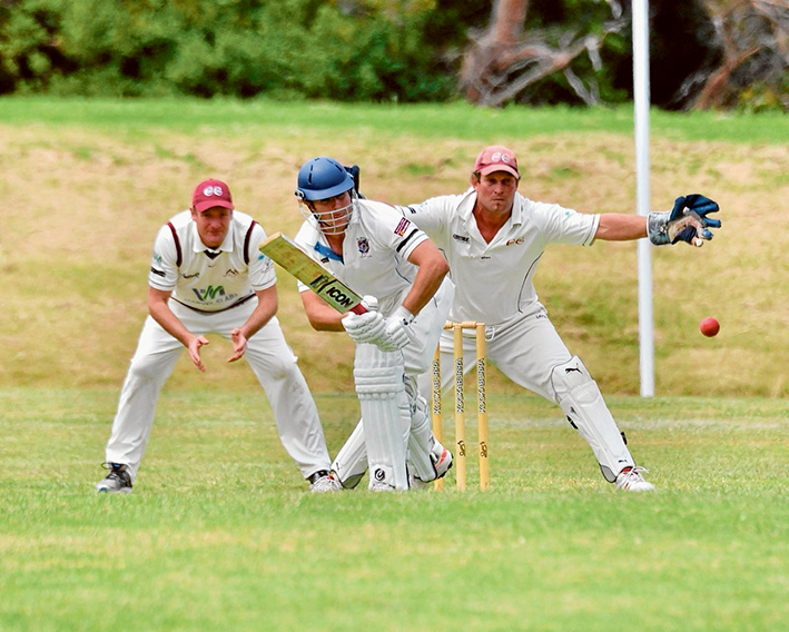 Flinders falter: (left and above) The home side scored just 127 runs, and now have Red Hill nipping at their heels. Pictures: Rab Siddhi
